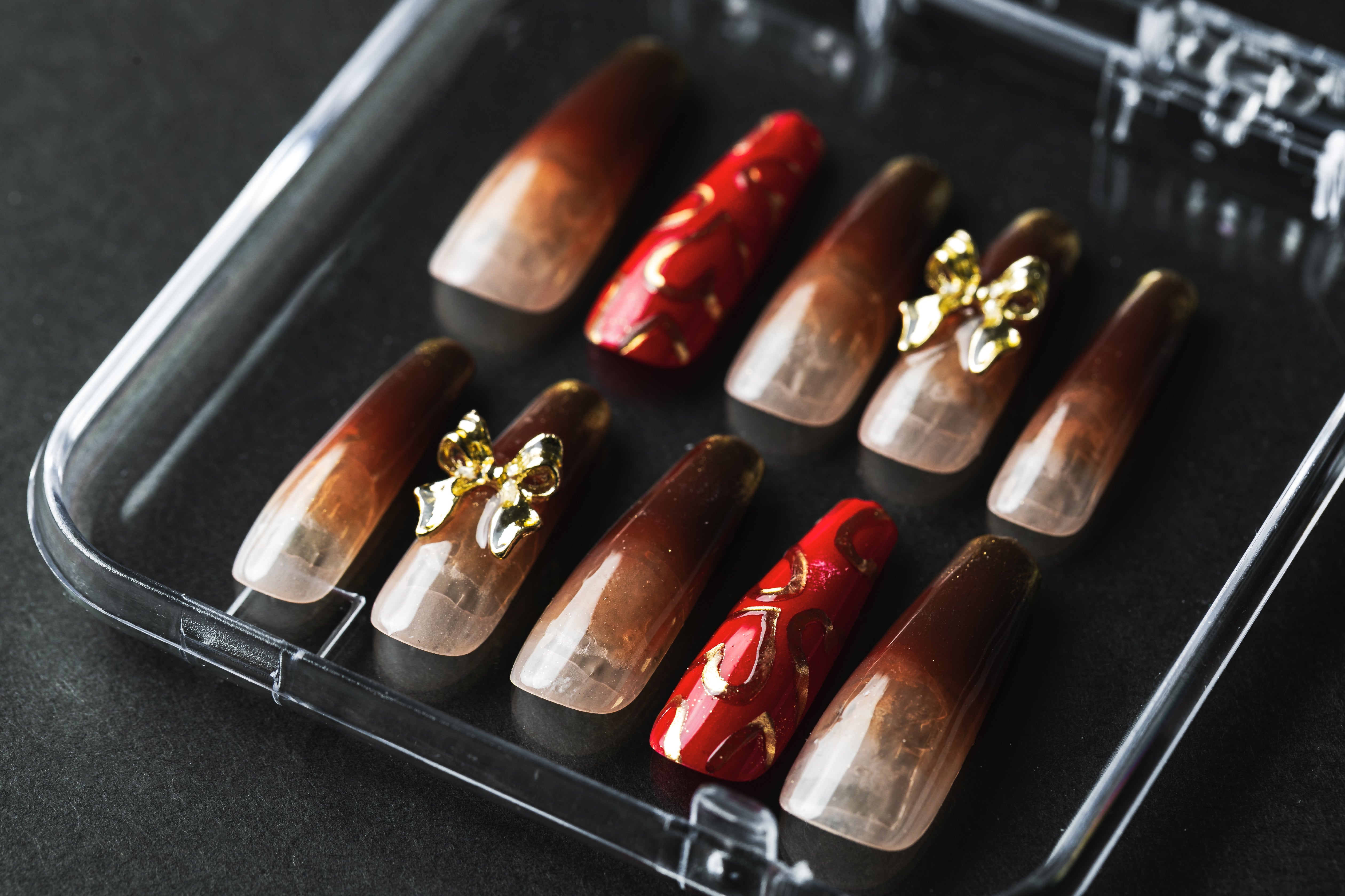 Gold heart ribbon design (custom nail tips)