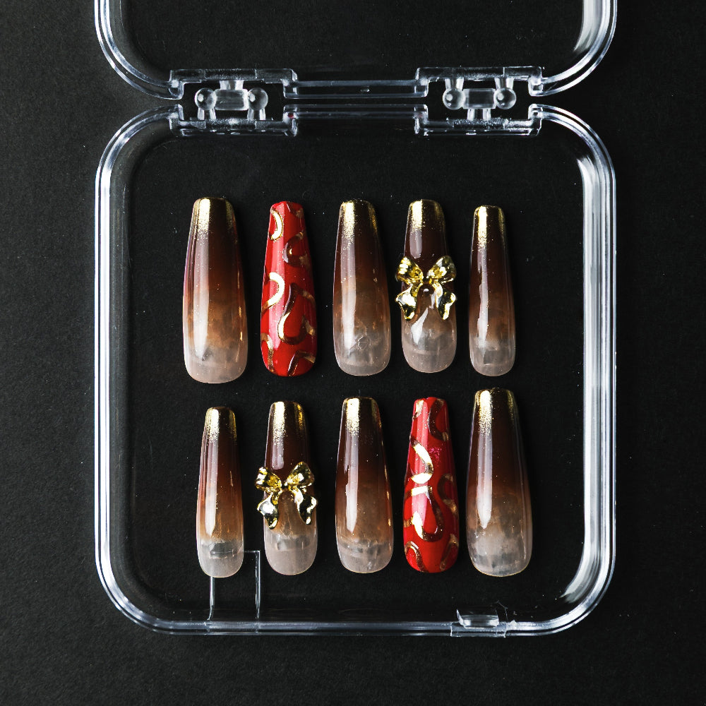 ゴールドハートリボンデザイン（オーダーネイルチップ）